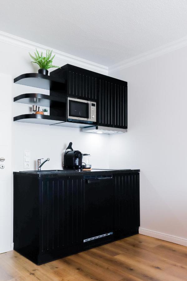 Strandnahe Moderne: Ferienwohnung mit Parkplatz und Garten Scharbeutz Exterior photo
